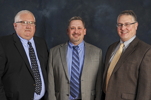 Group picture of PFN Senior Management—Tim McKee, Todd Proehl, and James F. Bednarek